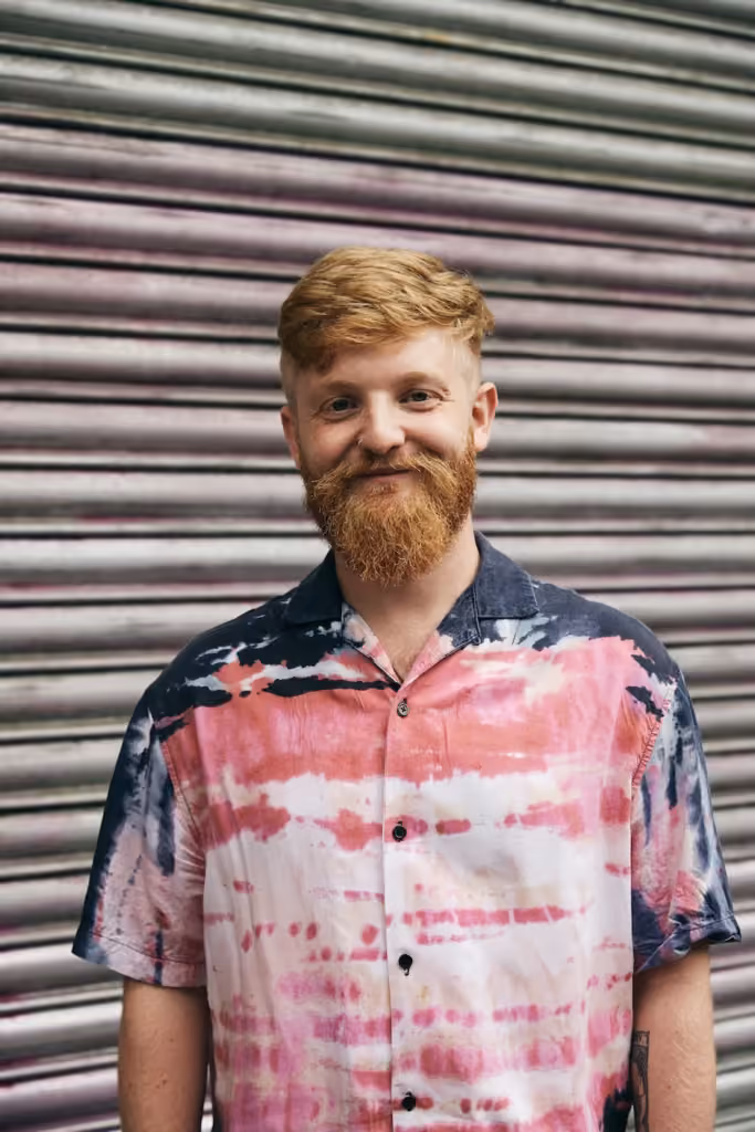 A photo of me in Brixton taken for Spaced Digital (2021).